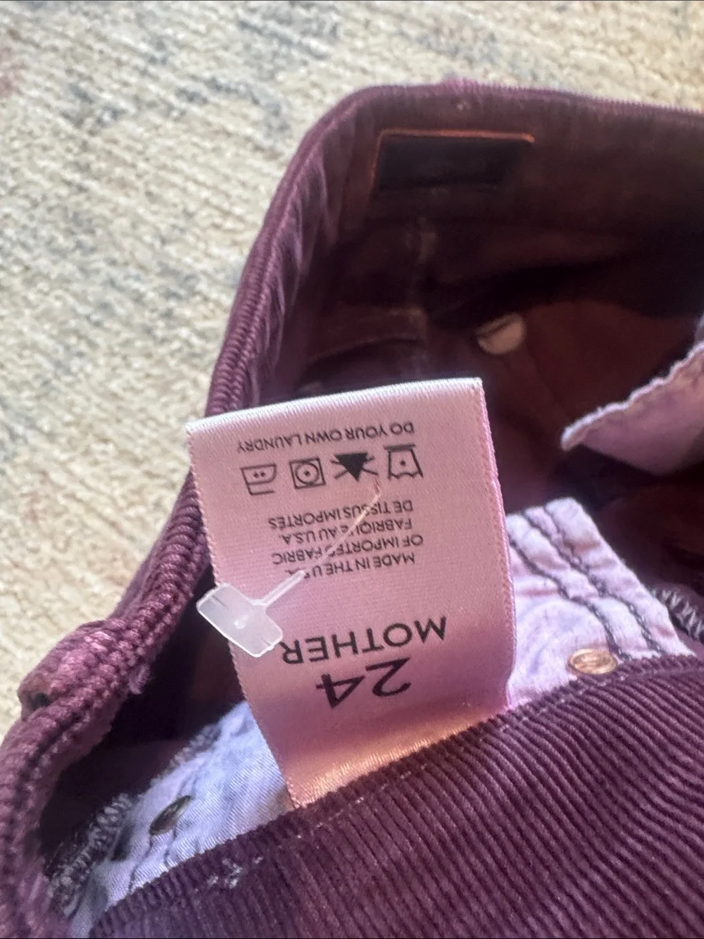 MOTHER the looker Women's Corduroy Pants in Deep Plum with frayed hem